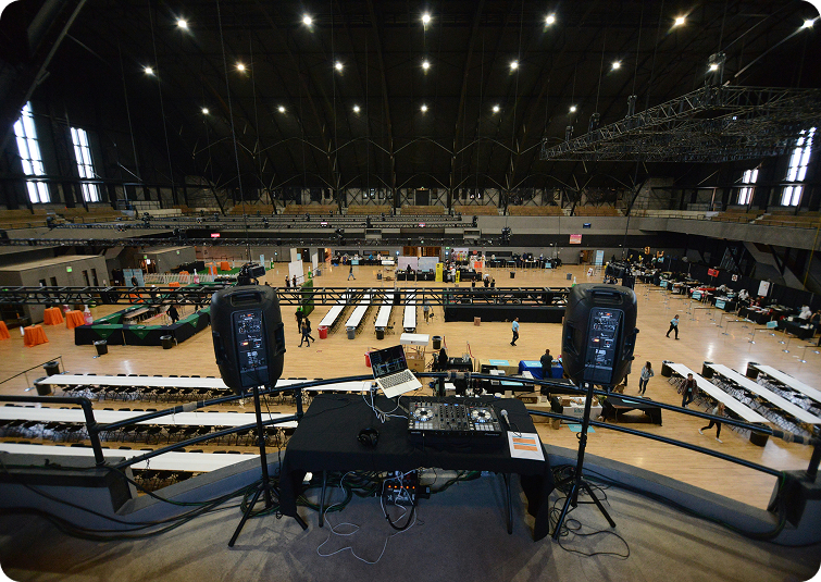 Event venue rigging setup with speakers and lighting equipment